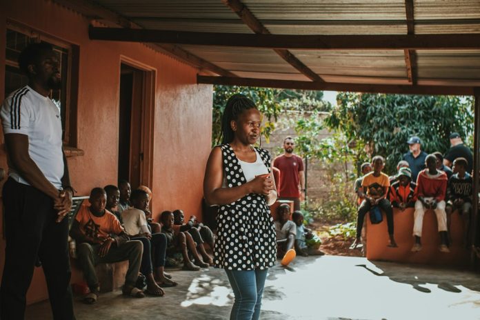 A community meeting illustrating public-health engagement; not an Ebola response scene