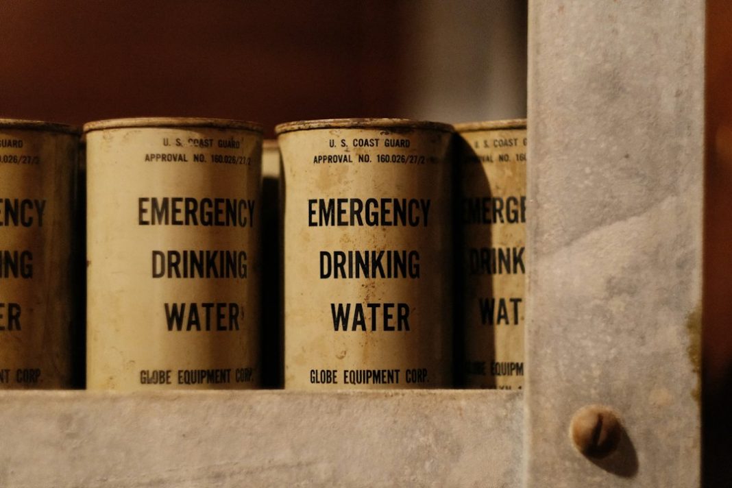 Sealed containers stored as part of a household emergency water supply