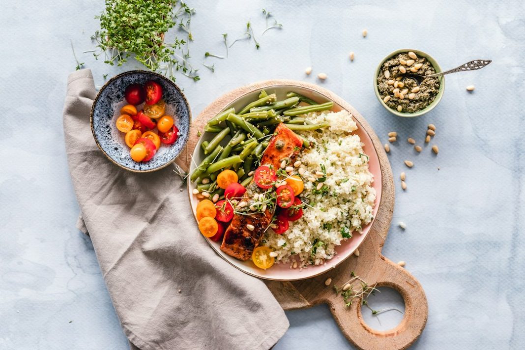 A colorful meal with vegetables and whole foods on a table