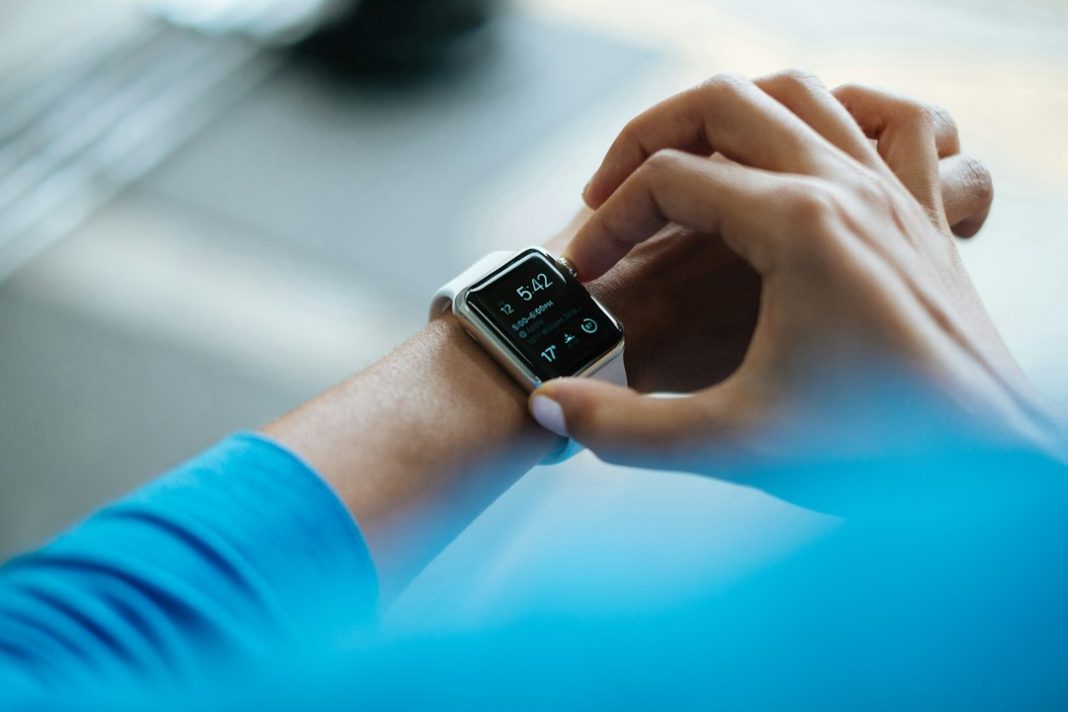 Person wearing a smartwatch for health tracking